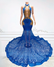 Glitter gold prom dress with blue sequin mesh and rhinestone accents, styled for formal events and glamorous occasions.