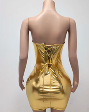 Gold strapless off-the-shoulder dress with crystal embellishments and sculpted fitness silhouette, styled for glamorous occasions.