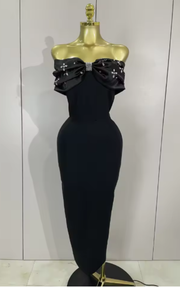 Kehlani off the shoulder beaded long bodycon bandage dress with sparkling bead details and elegant slim fit.