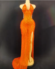 Nyomi sparkly rhinestone halter mesh transparent prom dress with shimmering details and elegant sheer fabric.