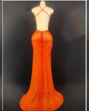Nyomi sparkly rhinestone halter mesh transparent prom dress with shimmering details and elegant sheer fabric.