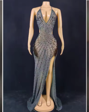 Nyomi sparkly rhinestone halter mesh transparent prom dress with shimmering details and elegant sheer fabric.