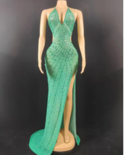 Nyomi sparkly rhinestone halter mesh transparent prom dress with shimmering details and elegant sheer fabric.