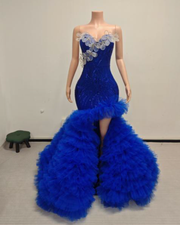 Sweetheart prom dress with floral appliqués and dramatic ruffled tulle skirt