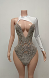 Silver rhinestone one-shoulder mini dress with sparkly detailing for party and nightlife wear.