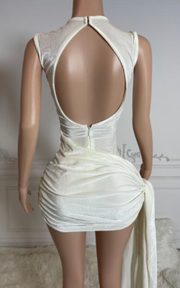 White birthday dress with silver sequin detailing and an elegant fitted silhouette.