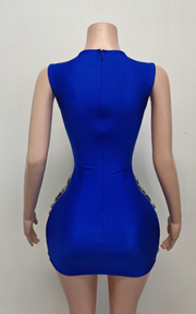 Sheer mini birthday dress with crystal beading and see-through mesh for party and nightlife wear.