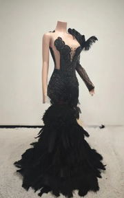 Black sparkly prom dress with rhinestones, diamond details, and ostrich feather train – elegant long evening gown for women