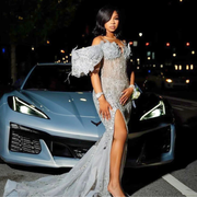 Sequin one-shoulder crystal mermaid prom dress with sparkling detailing and dramatic silhouette.