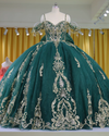 Emerald green and gold ball gown with lace appliqué bodice and beaded fringe sleeves
