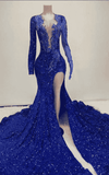 Luxury formal gown featuring royal blue sequins and mermaid flare