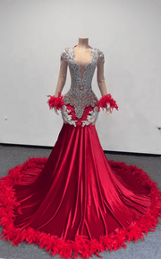 Elegant silver formal dress featuring lace appliqué and feather accents