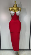 Red backless bodycon maxi dress with diamond embellishments.