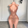 Mannequin Wearing a Rose Gold Sparkly Cocktail Birthday Dress with Sequin Embellishments and a Sleek Silhouette, Styled for Luxe Celebrations