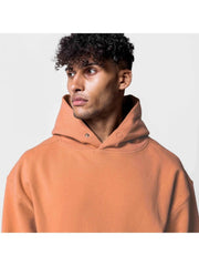 Solid Loose Pocket Hooded Tops For Men